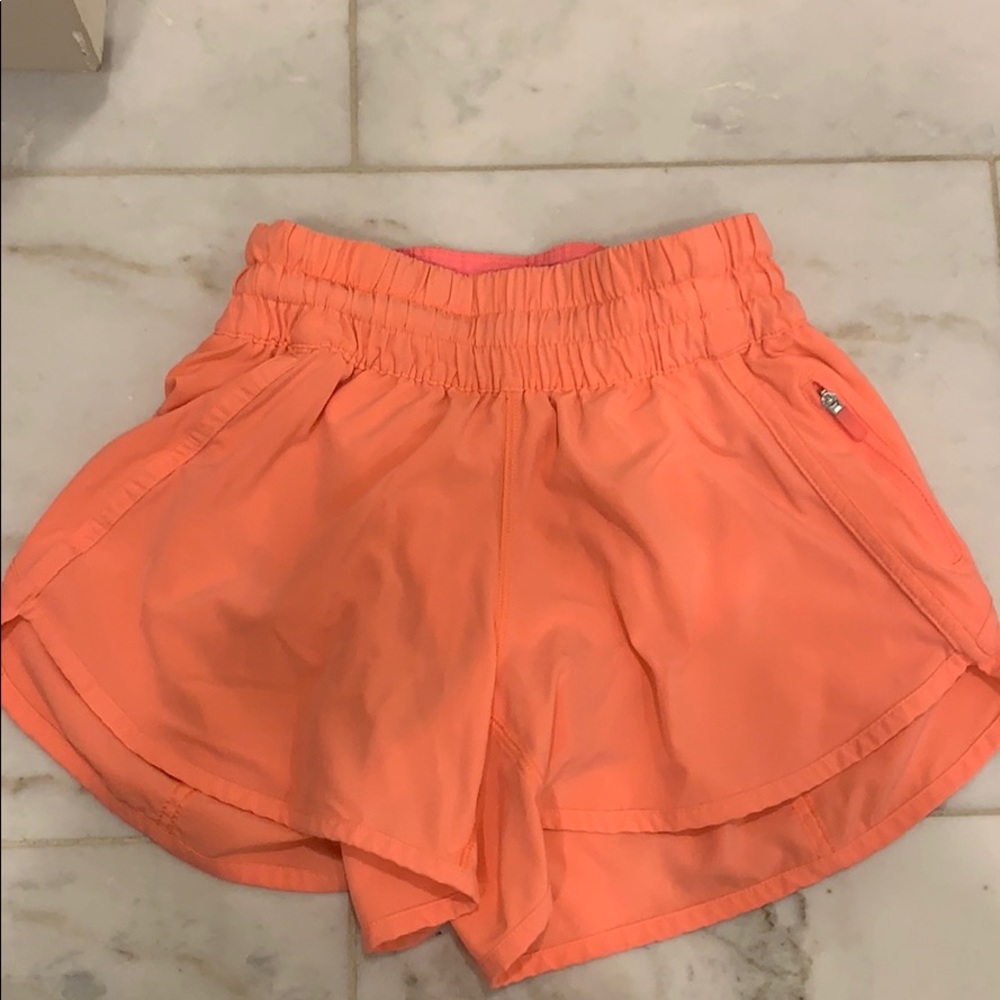 Lulu tracker short V 4” in Sunset, size 4